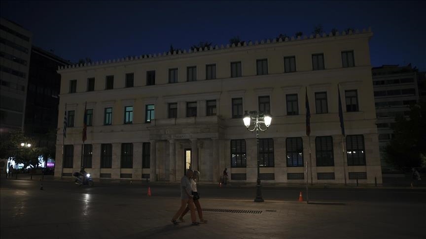 Athens municipality building turn off lights to save energy