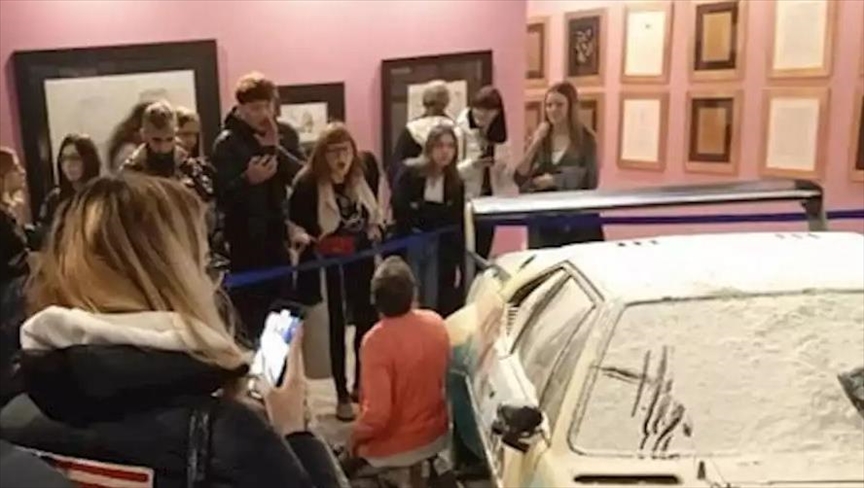 Climate activists throw flour on Andy Warhol car in Italy