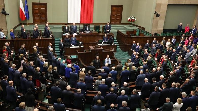 Poland’s justice minister survives no-confidence vote