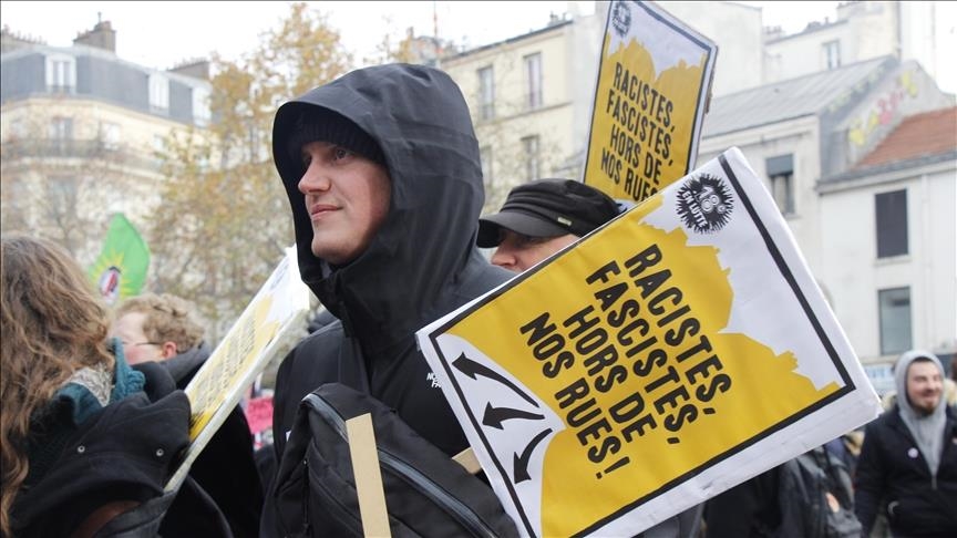 Thousands march in Paris against new immigration bill