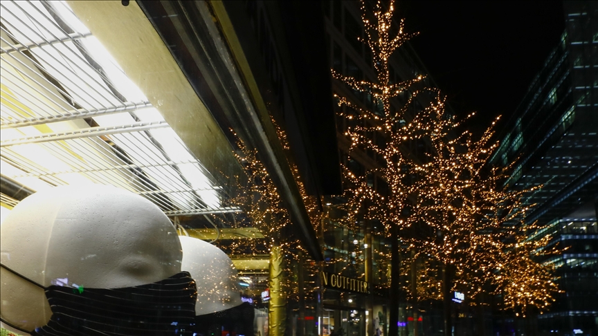 German climate activists cut top off Berlin Christmas tree