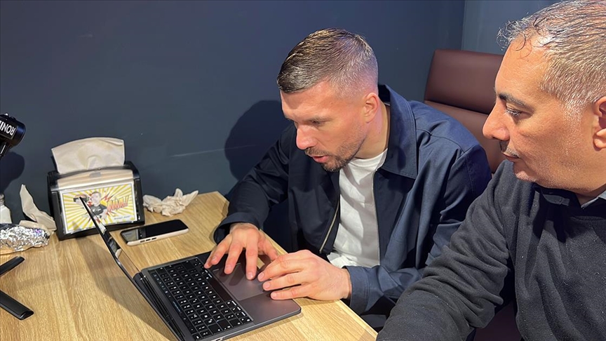 Lukas Podolski'nin "Yılın Fotoğrafları" oylamasında tercihi "Şampiyonlar" oldu
