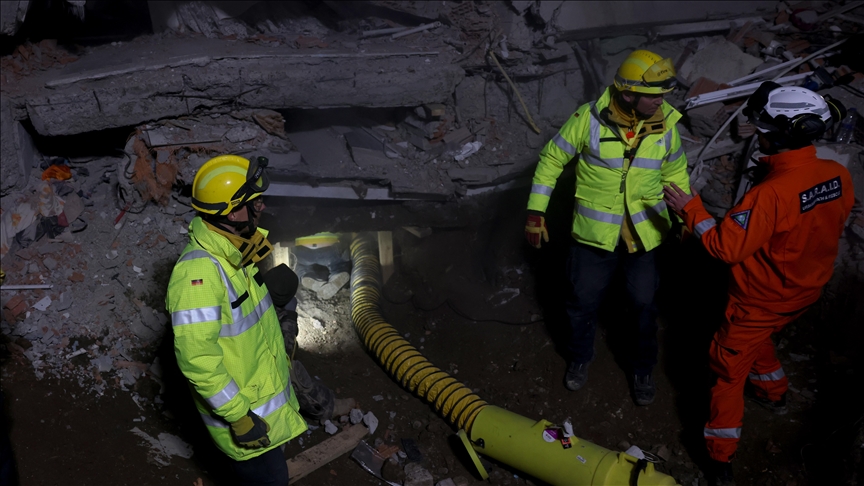 Rescue workers from the UK assisting with search operations in earthquake-affected areas