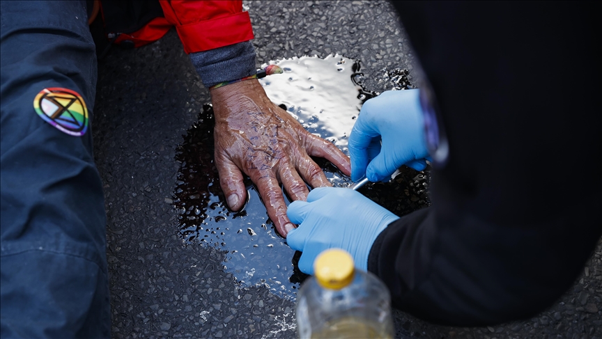 German climate activists spray colored water onto Transport Ministry building