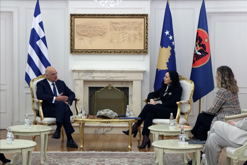 Greek foreign minister visits Kosovo ahead of its normalization talks with Serbia