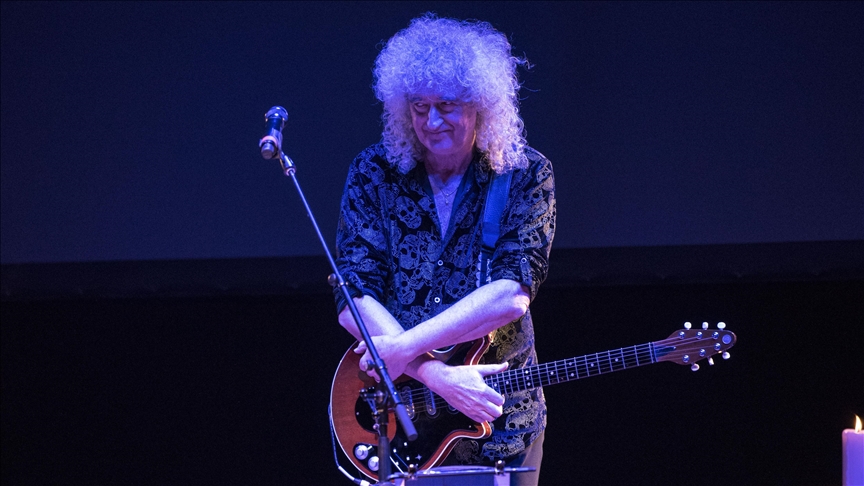 Queen guitarist Brian May knighted by Britain's King Charles