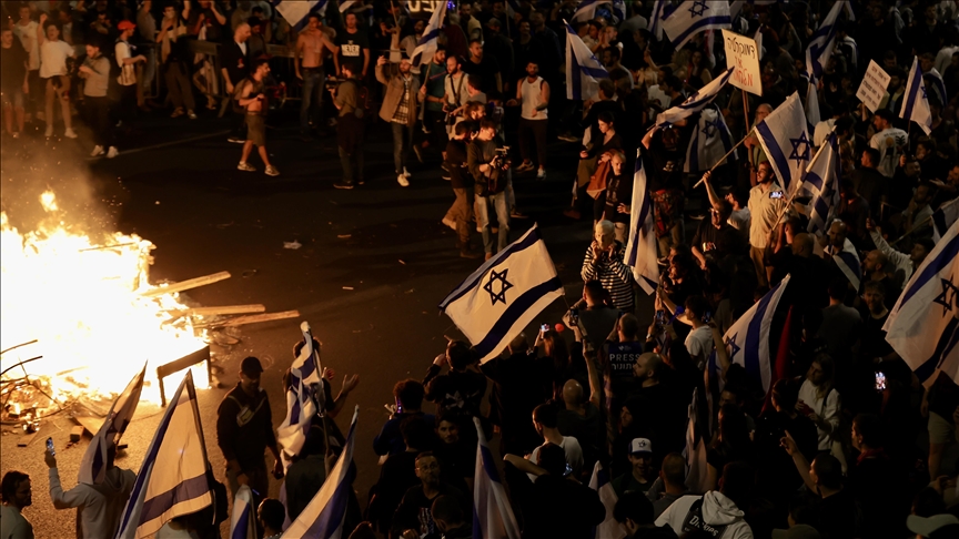 Thousands of Israelis protest Netanyahu's sacking of defense minister