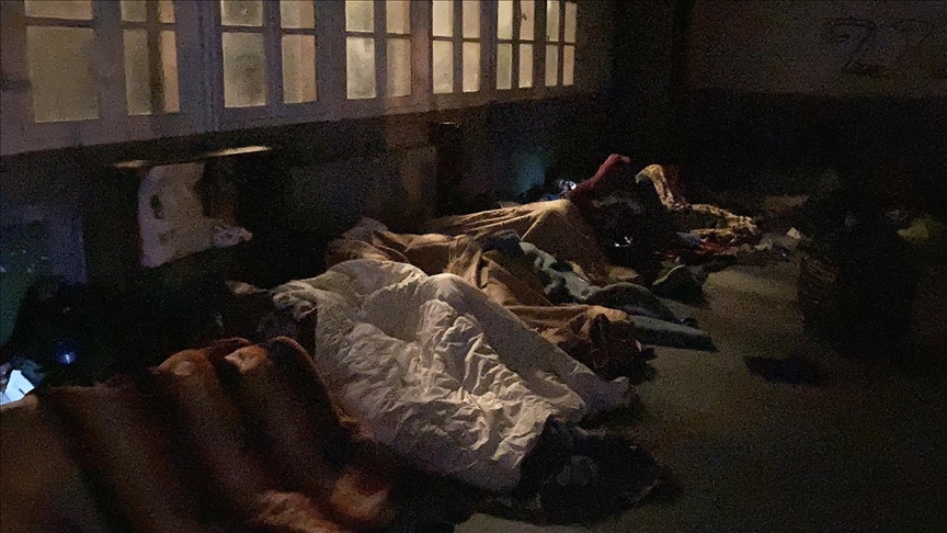 Teenage refugees in Paris seek shelter in abandoned school building