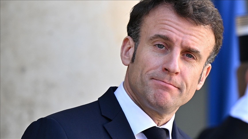 French president visits eastern towns amid boos over pension reform
