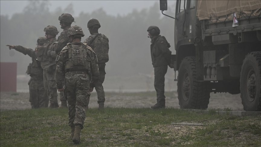 NATO chief calls on military alliance's members to step up defense spending