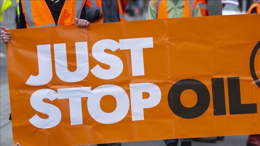 Just Stop Oil activists throw paint over flower garden in London