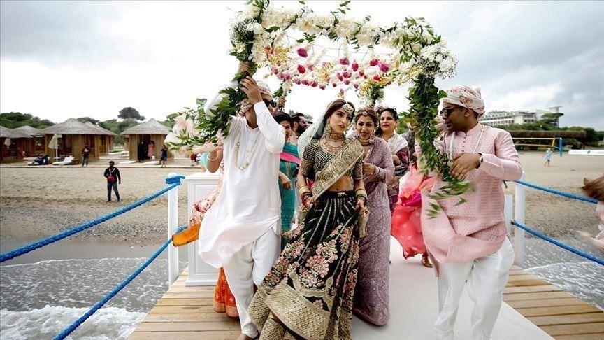 Over 2,100 couples marry at mass wedding event in India