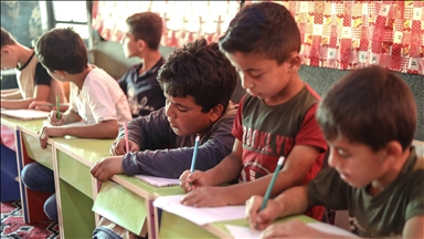 Syrian earthquake victim children continue education in mobile classrooms