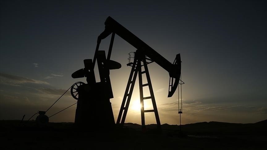 Oil down as markets weigh bullish US economic data