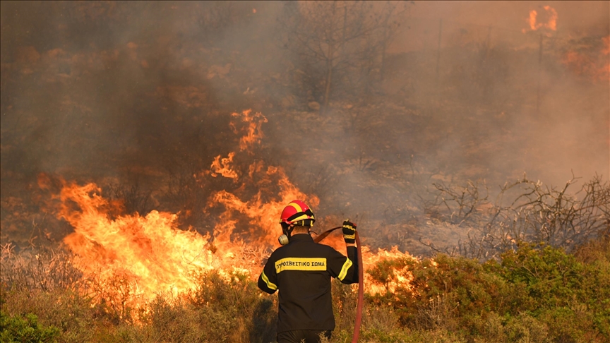 Evacuations ordered as firefighters battle 2 large wildfires in Greece Evacuations ordered as firefighters battle 2 large wildfires in Greece
