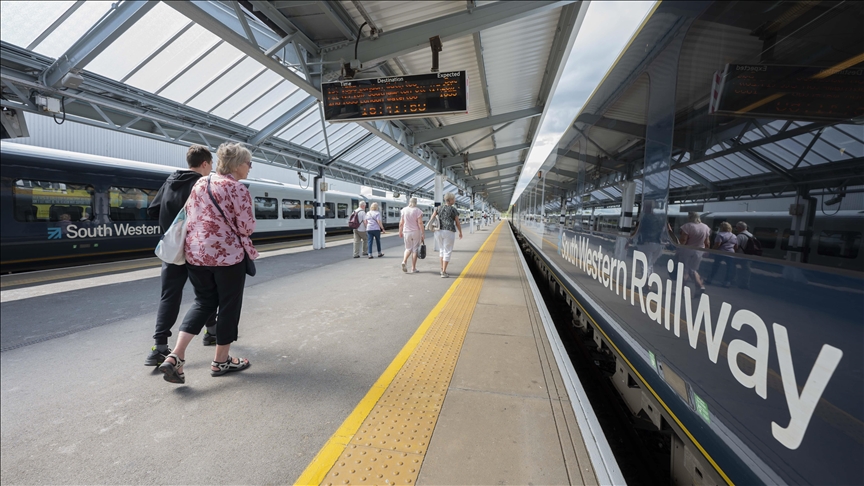 Thousands of railway workers in UK go on strike over pay, conditions