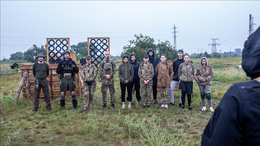 Civilians in Ukraine's capital take part in military training