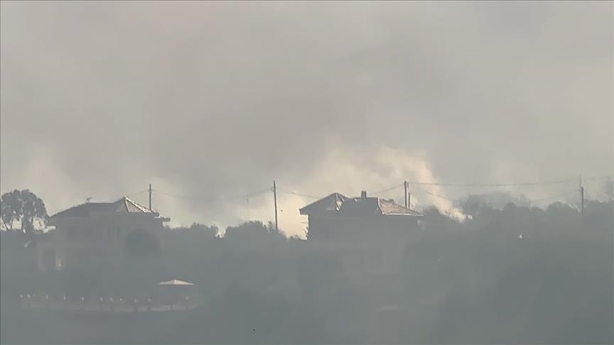 Wildfires cause major explosions at ammunition dump in Greece