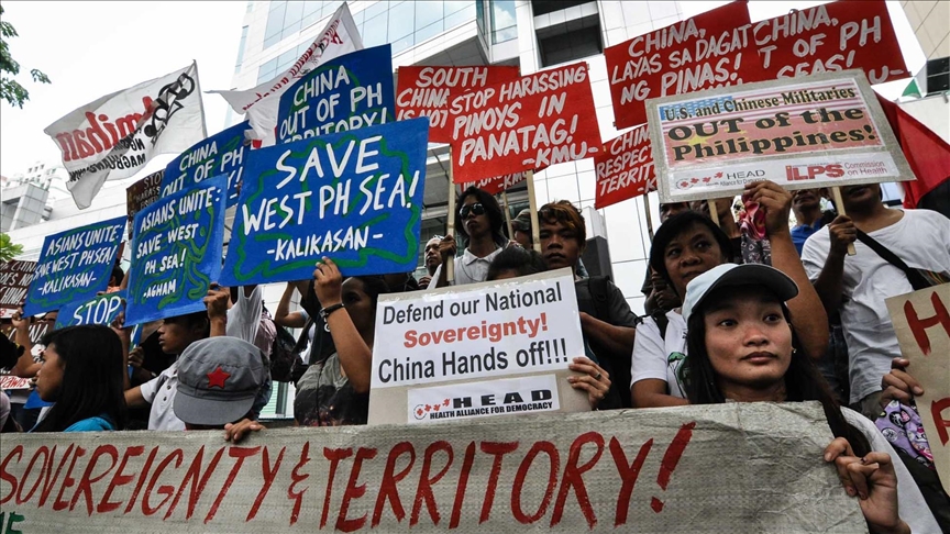 Chinese military backs firing water cannon at Philippines vessels