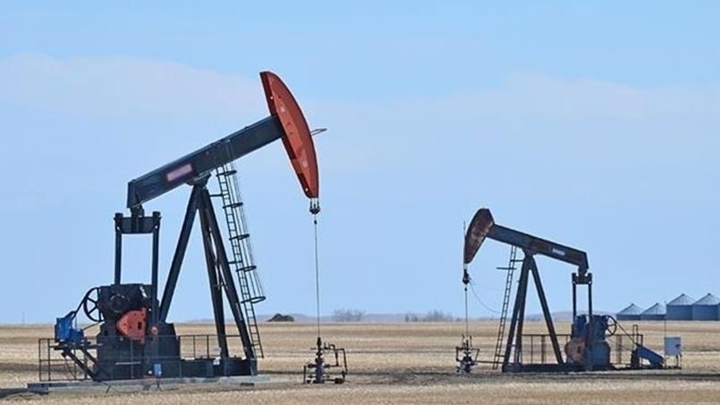 Oil prices up with China's policy rate cut, weak dollar
