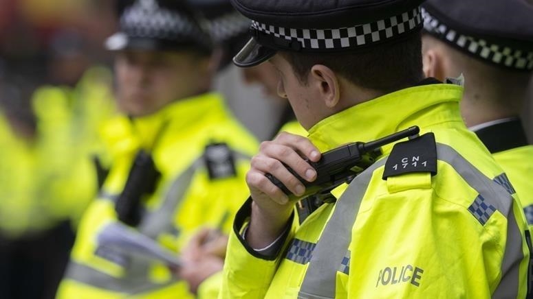 6 former police officers in UK charged over racist WhatsApp messages