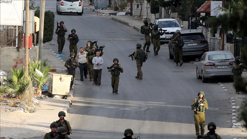 Israeli army raids multiple cities in West Bank, detains tens of ...