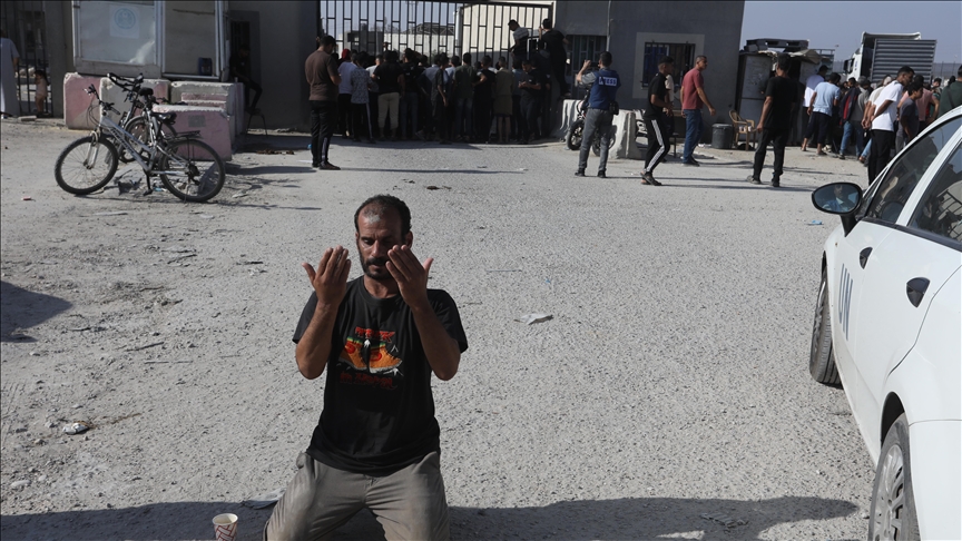 Palestinian workers search for their families in Gaza after being deported from Israel