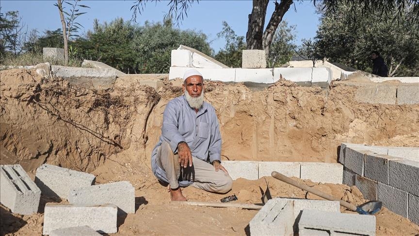 'I can't sleep due to the large number of child corpses I have seen’: Gaza gravedigger