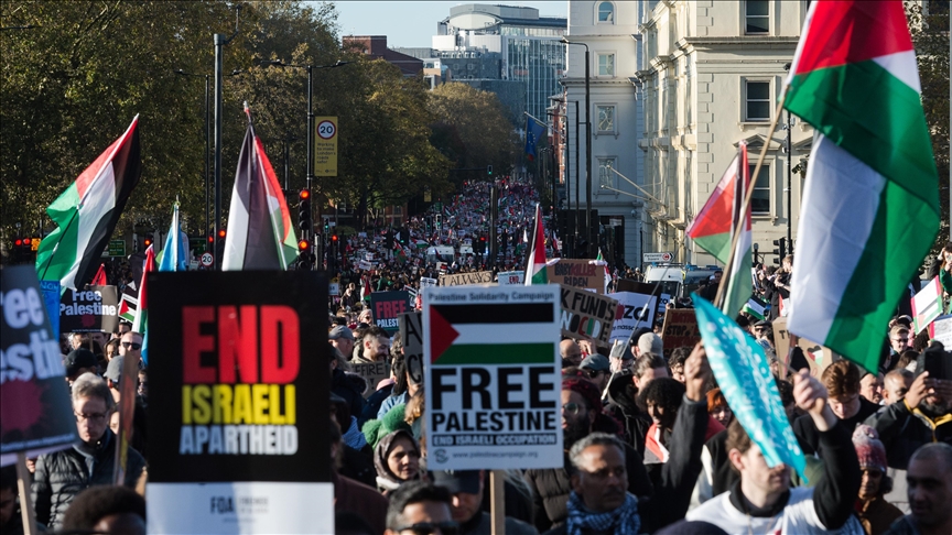 Hundreds of thousands march in London to call for cease-fire amid controversy over protest on Armistice Day