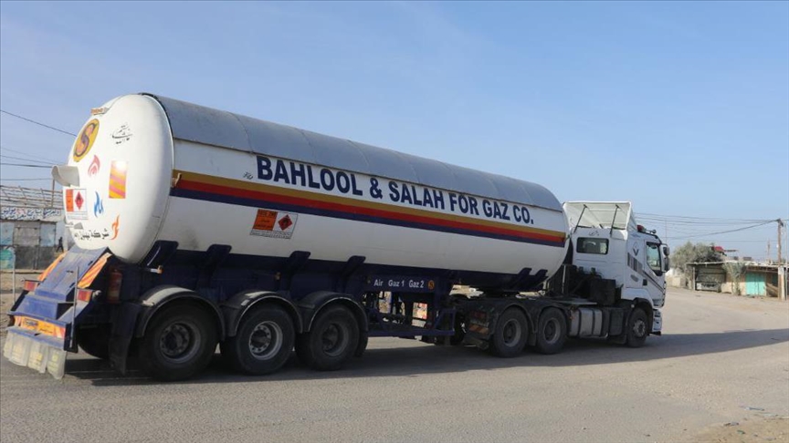 Fuel trucks start entering Gaza from Egypt as humanitarian pause takes effect