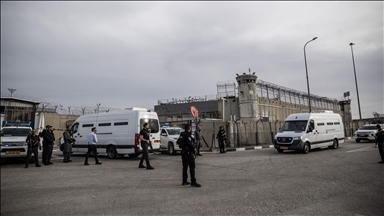 Palestinian prisoners arrive at Ramallah's Ofer Prison in West Bank before their release
