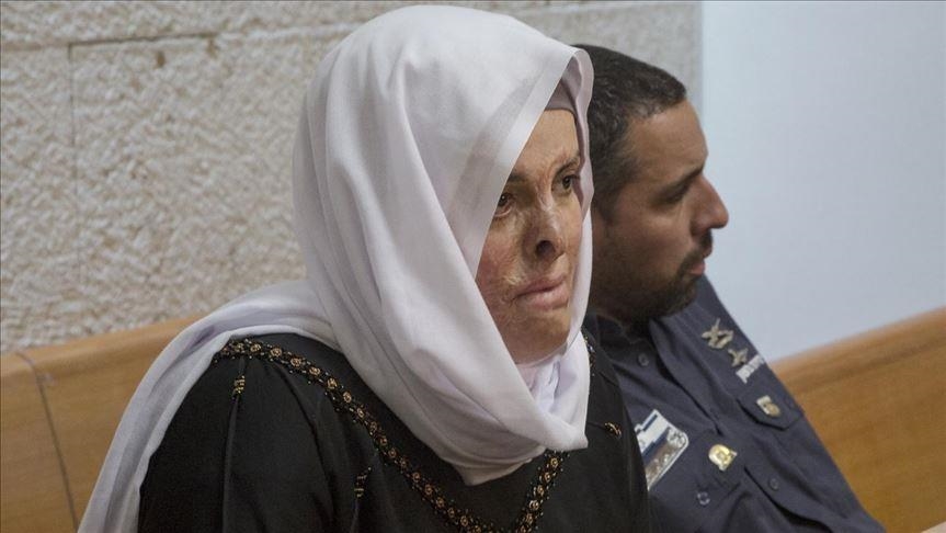 Palestinian Israa Jaabis arrives home after her release from Israeli jail