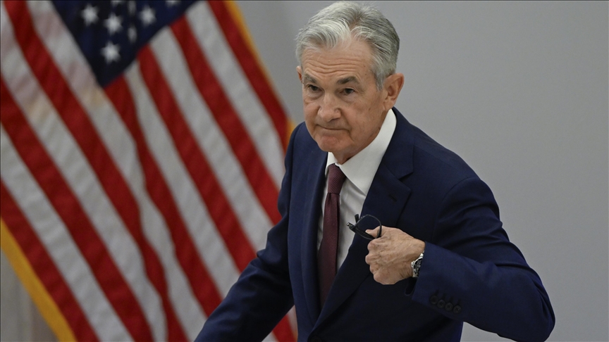 Fed chair says lowering rates 'begins to come into view'