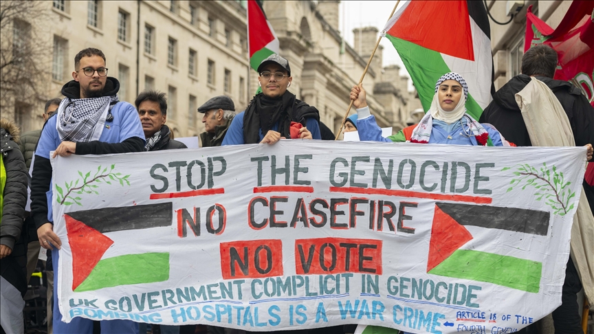 British health care workers hold silent march in support of Gaza medical staff