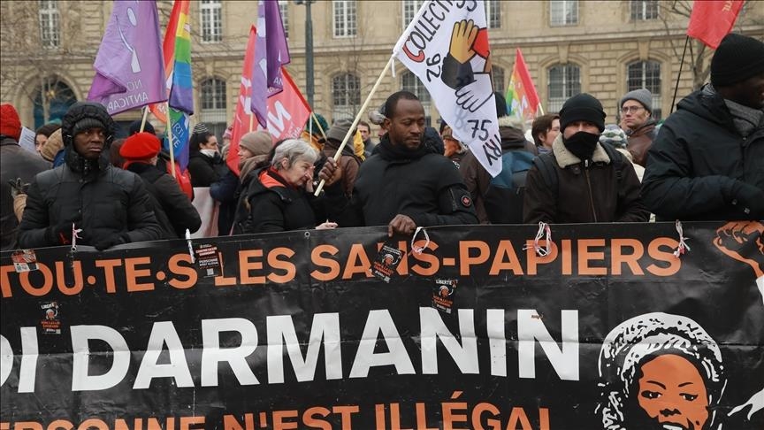 Protesters take to streets across France to condemn immigration law
