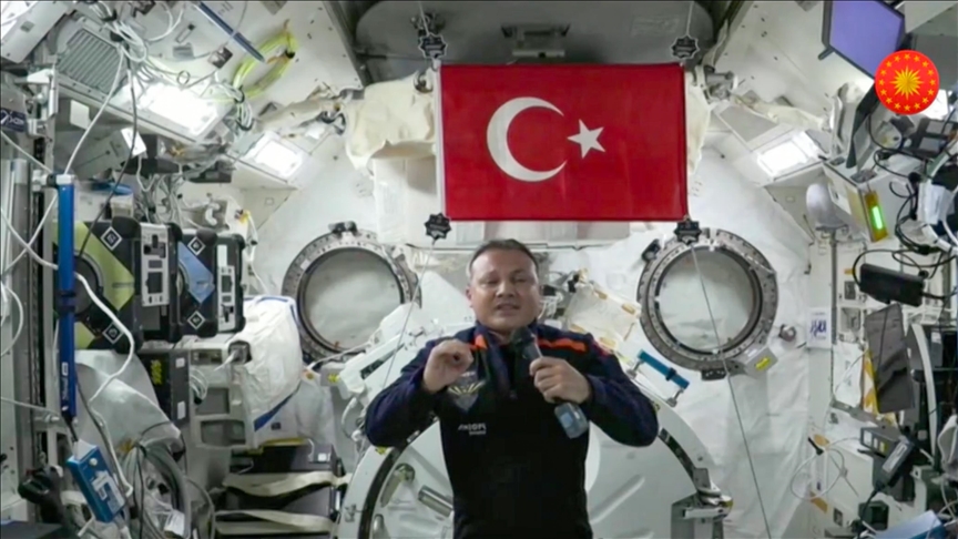 Turkish astronaut says Crescent and Star flag propelled him into Earth orbit