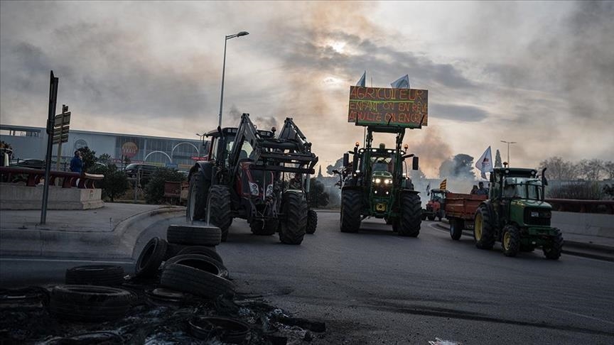 French premier abandons fuel tax hikes for farmers amid protests
