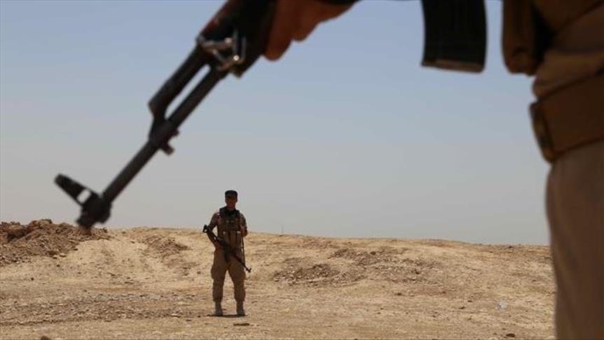 Iraqi Shiite militia group Kataib Hezbollah claims it suspended attacks on US forces
