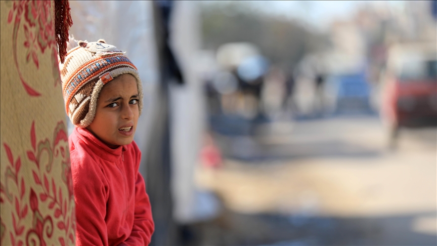 Gazan children try to stay warm during harsh winter amid Israeli attacks