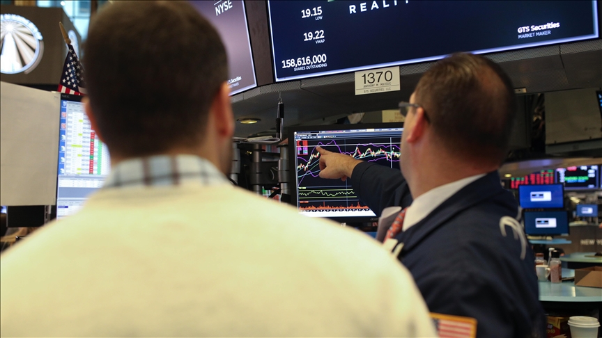 S&P climbs to record 5,000 level but closes lower