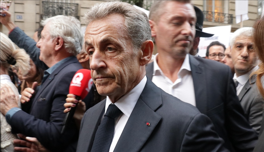 Former French president sentenced to reduced jail term in appeal
