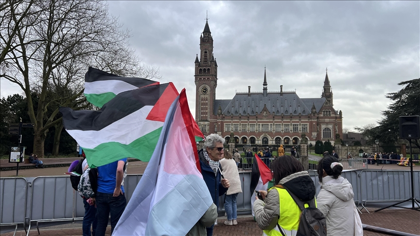 Protesters burn Israeli flag in front of ICJ