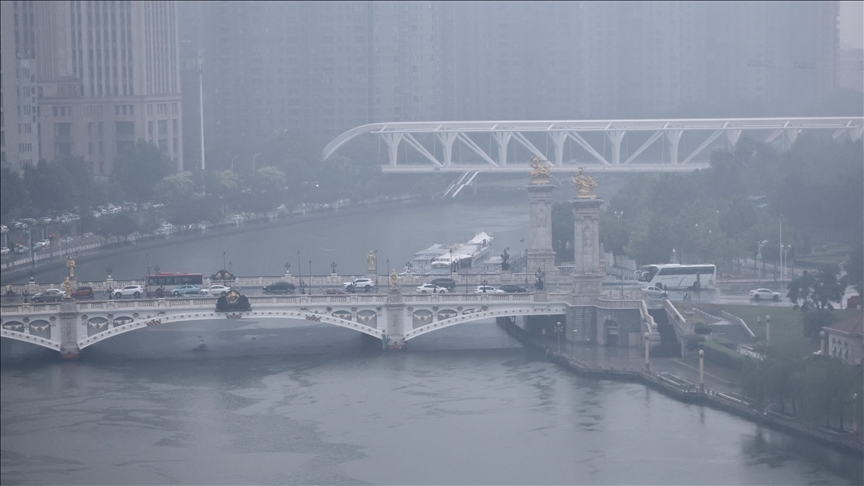 2 killed when cargo ship rams bridge in China, sending vehicles into water
