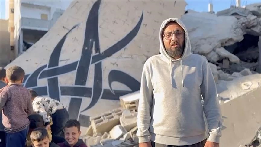 Palestinian graffiti artist shows pain of Gaza's people on walls of destroyed buildings