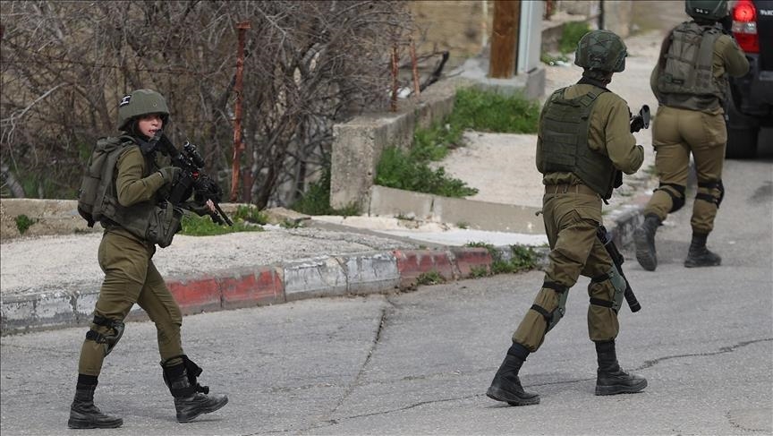 Israel arrests 20 more Palestinians in West Bank raids