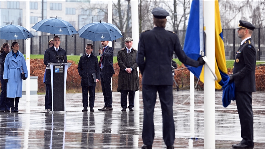 Sweden’s flag raised outside NATO headquarters in Brussels