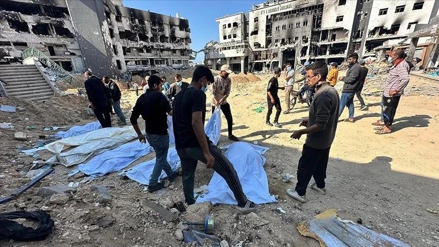 Gaza civil defense teams retrieve bodies of Palestinians killed by Israel in Khan Younis