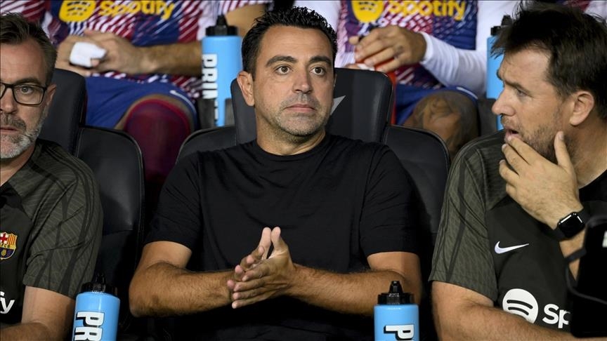 Xavi to remain at helm of Barcelona