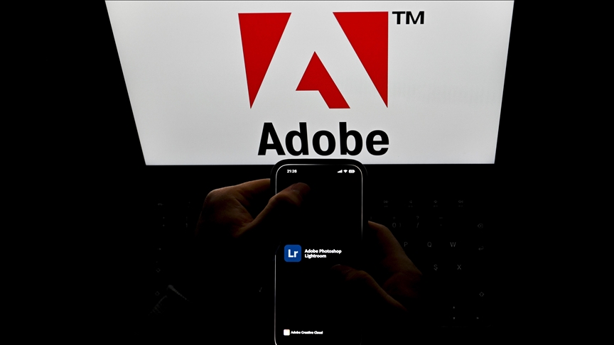 Adobe shares jump 14% as software firm posts record revenue