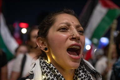 Palestinian woman sings to amplify homeland's voice amid rubble in Gaza